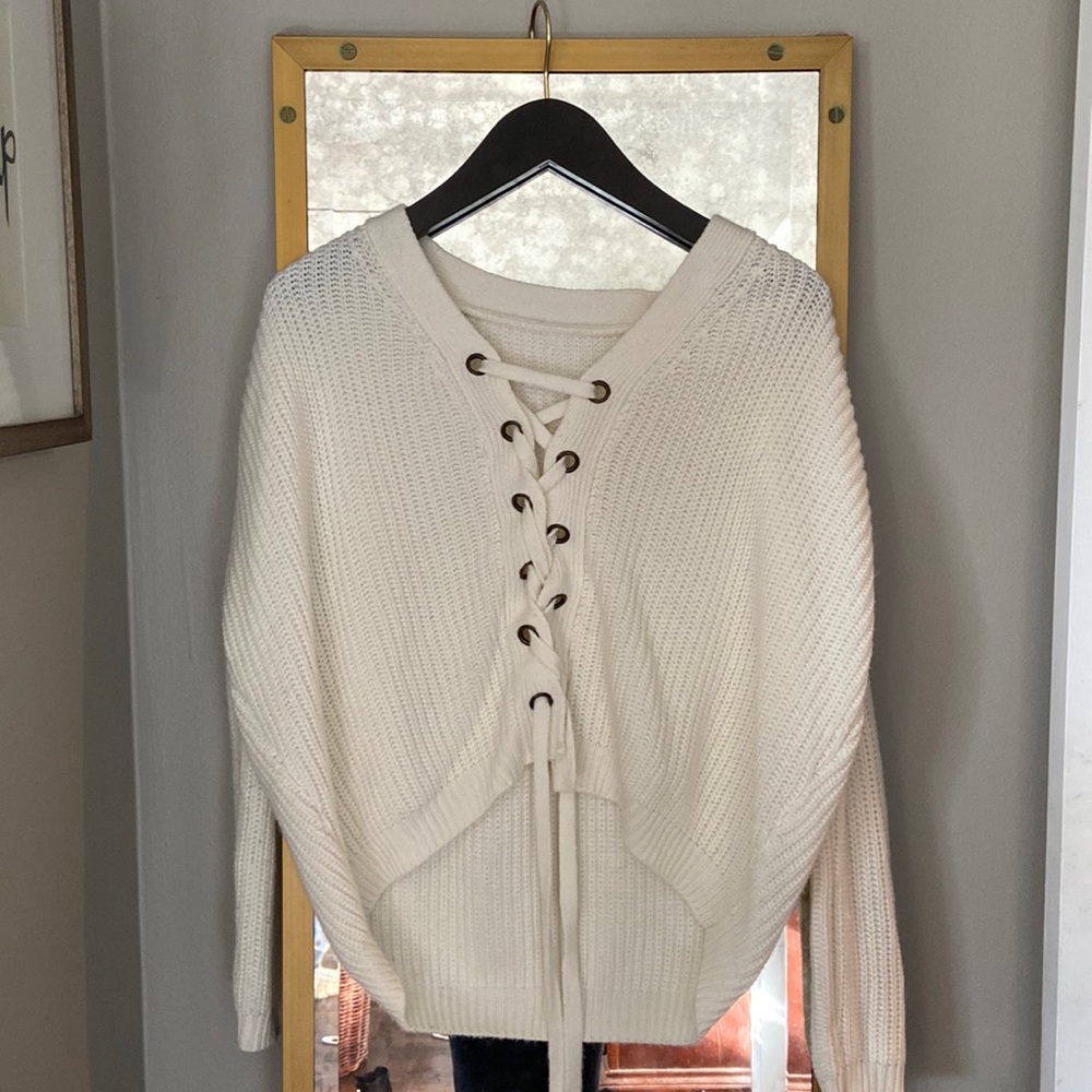 Haute Rogue tie sweater. One size fits most but fits closer to a size S.